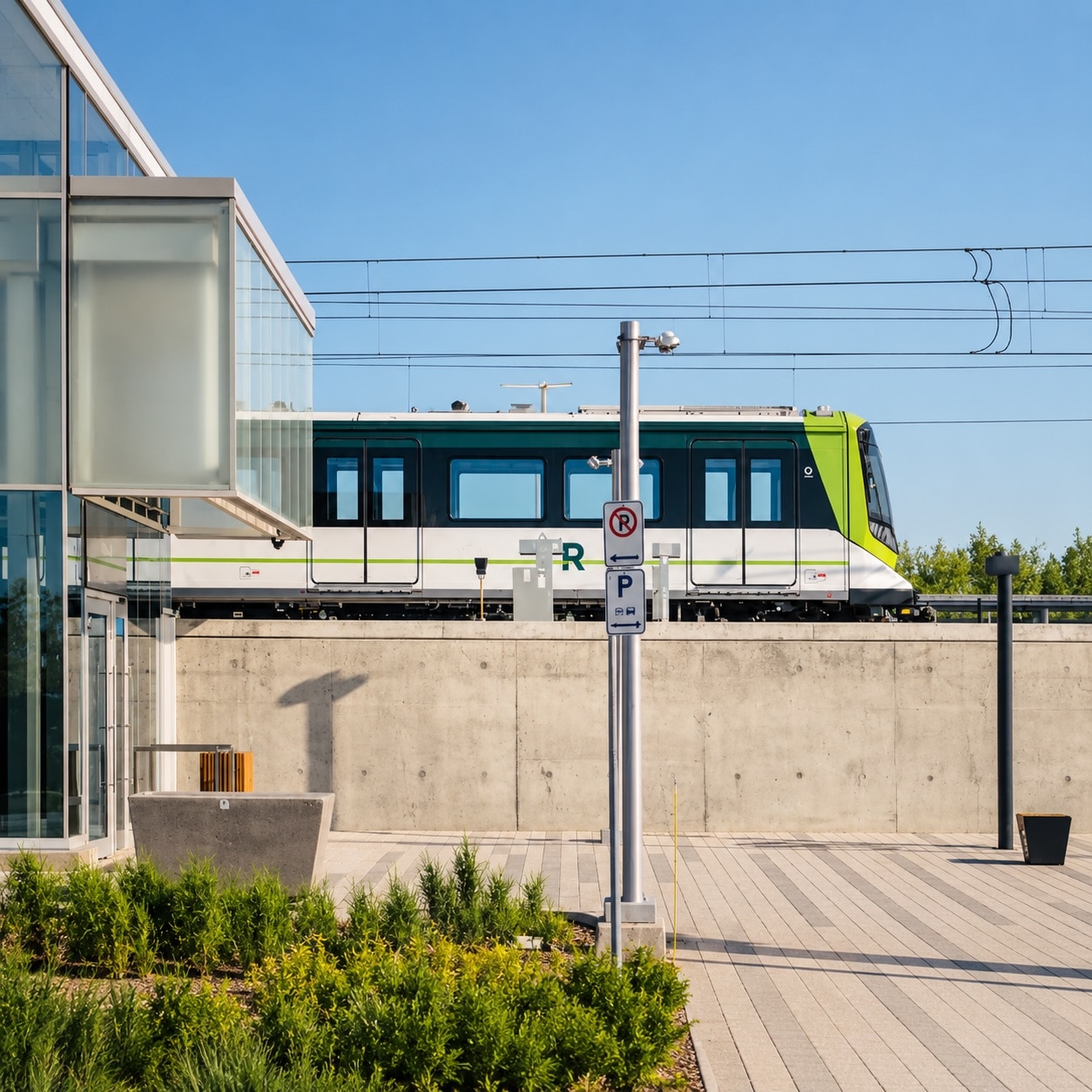 REM train at the station near Le Sherwood in Mount Royal